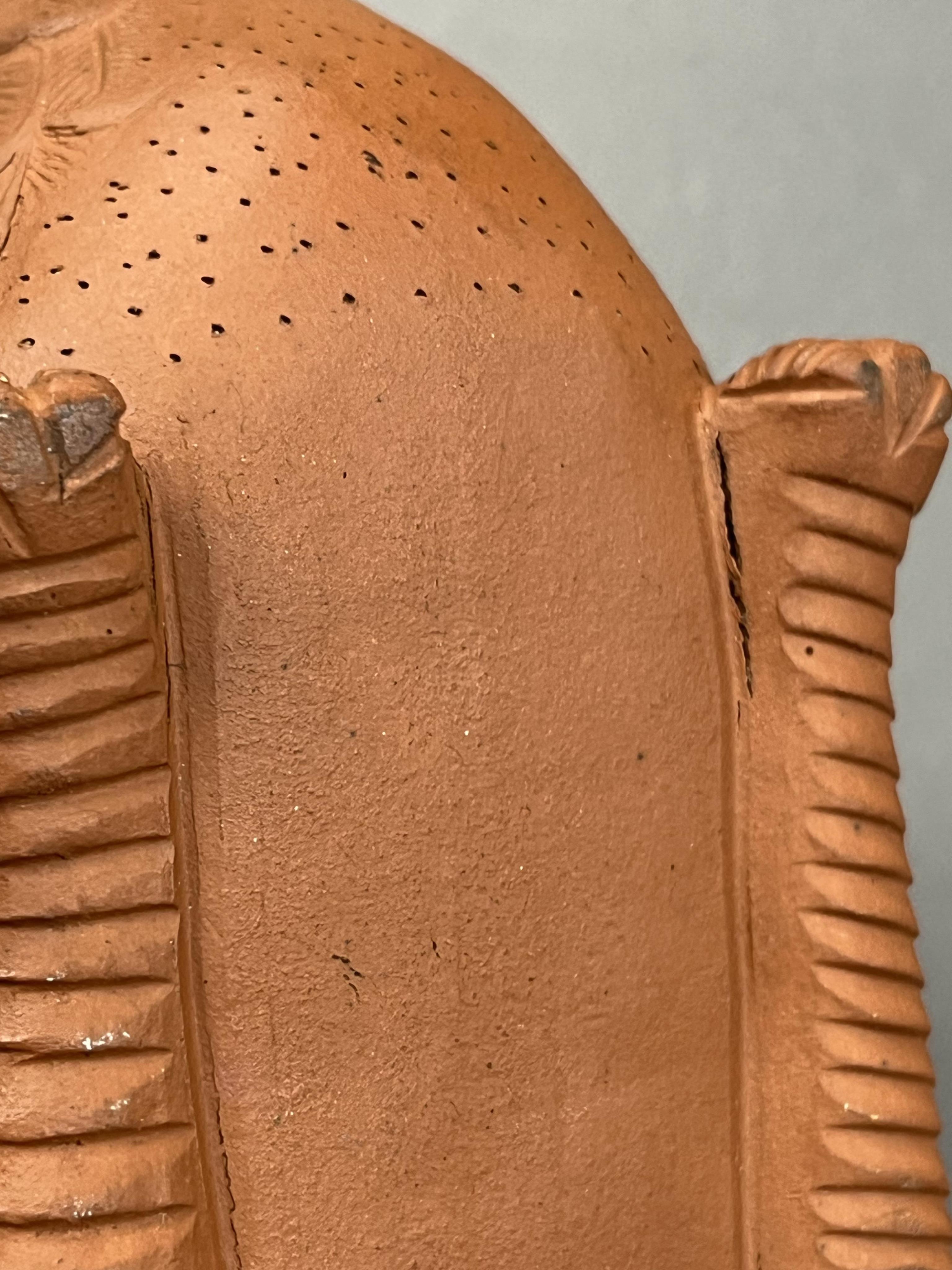 A Chinese Yixing 'Phoenix' teapot, late Qing dynasty